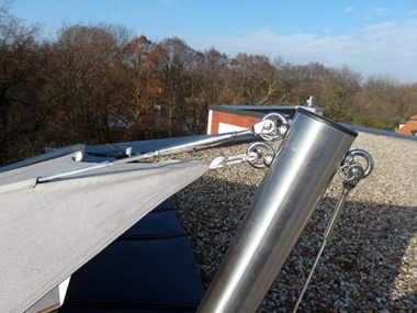 Befestigung eines fixen Sonnensegels an einem Mastende